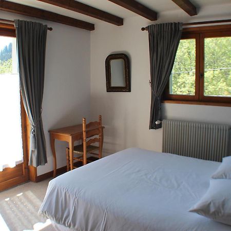 Le Taconet Hotel Le Praz de Lys Quarto foto