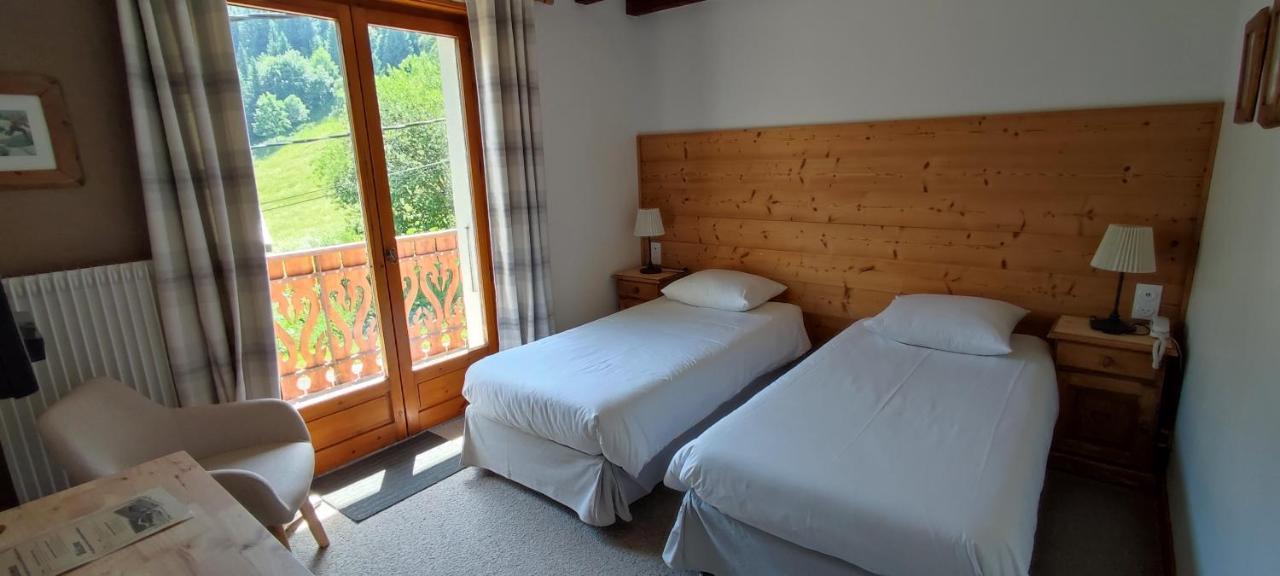Le Taconet Hotel Le Praz de Lys Quarto foto